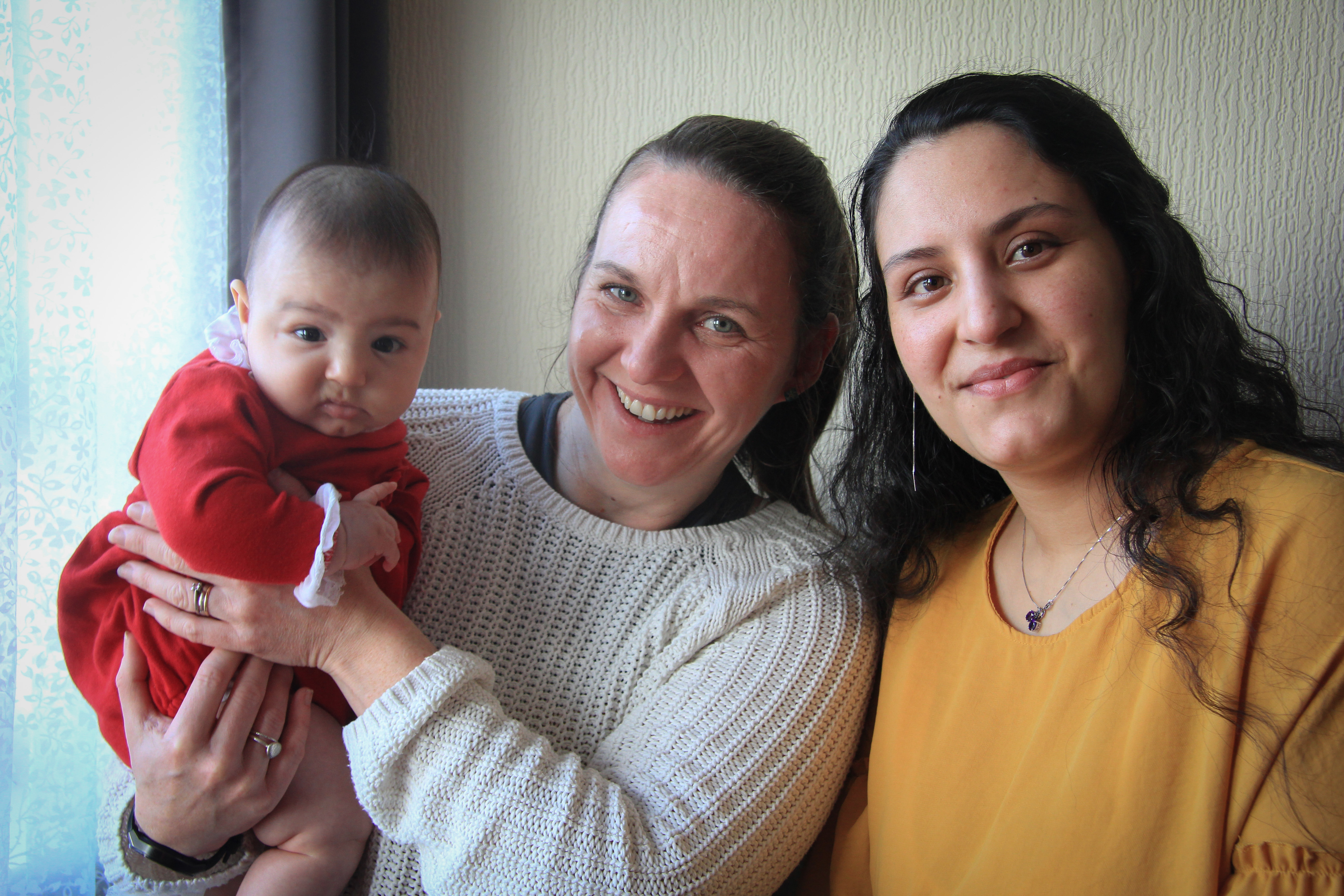 mother, volunteer companion and baby